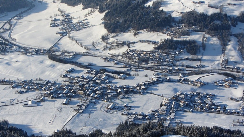 Brixental valley with ski runs and Alpine landscape in winter