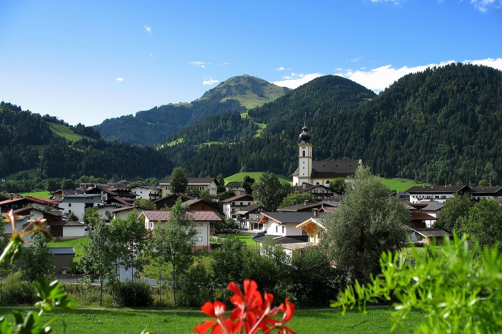 Söll ski area in the SkiWelt with snow-covered village below