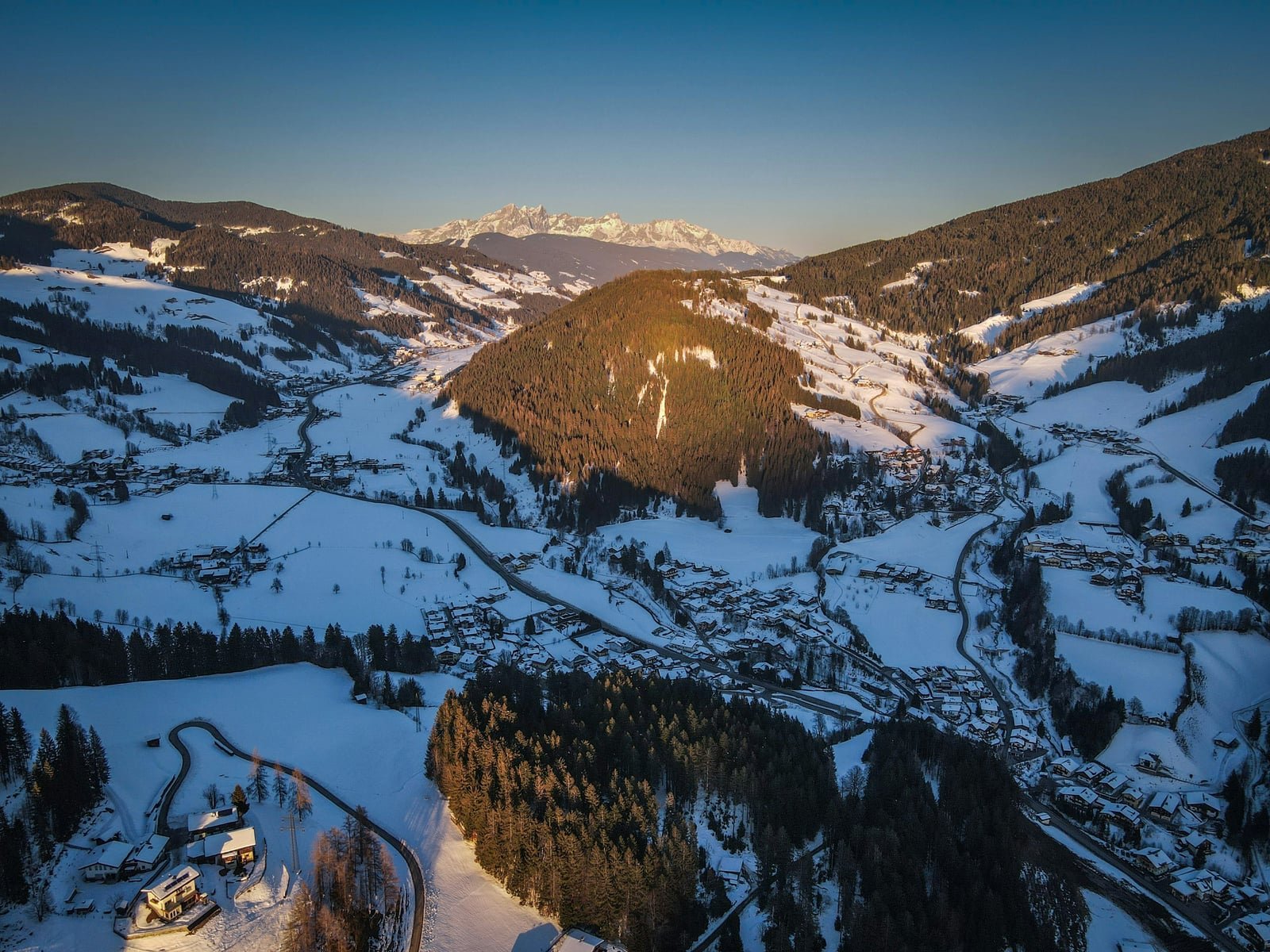 Wagrain ski village surrounded by winter slopes and Alpine chalets
